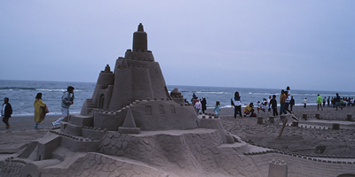 photo: sand castle on beach